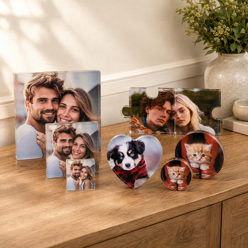 Collection of square, double puzzle, heart and round acrylic photo blocks with family and pet photos.